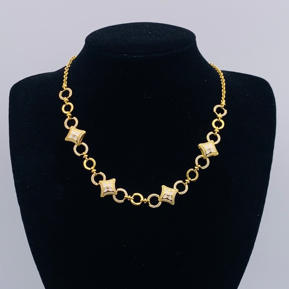 Gold Necklace with Star Accents